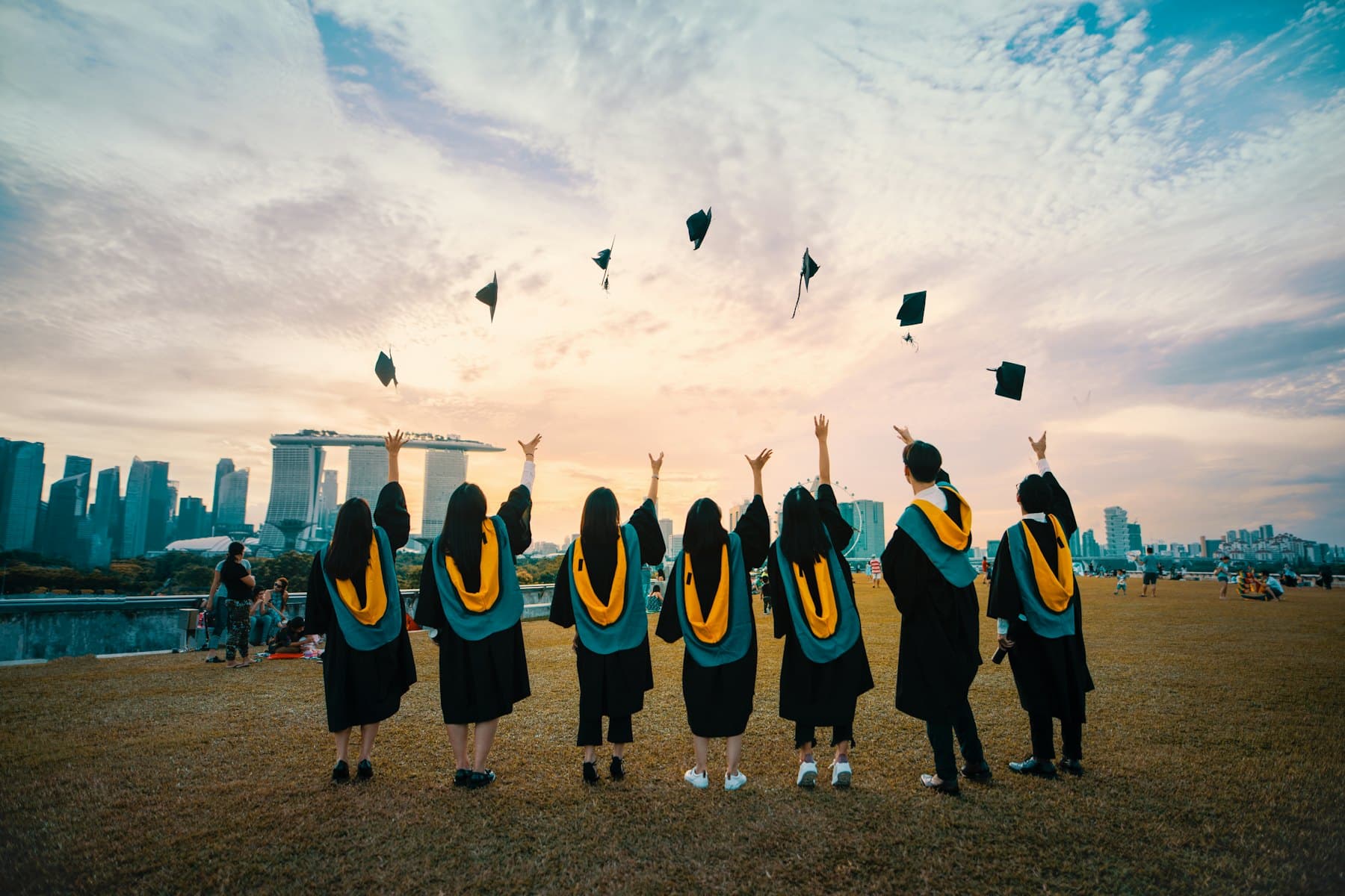 Graduates celebrating at their commencement ceremony